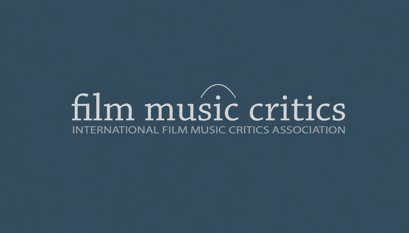 International Film Music Critics Association logo featuring white serif text on a dark blue background.